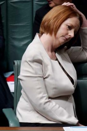 Julia Gillard during yesterday’s showdown in which the PM was told she should resign.