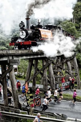 Steam heat: More than 3000 runners took on Puffing Billy on Sunday.
