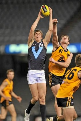 Joe Daniher marks while playing for Vic Metro against Western Australia.
