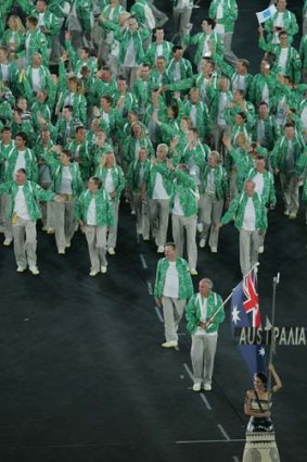Flag bearer Colin Beashel leads Team Australia during  the opening ceremony for the 2004 Athens Olympics.