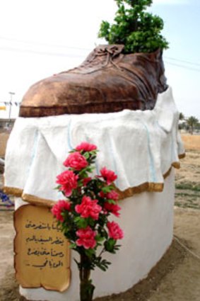 Stat-shoe ... the monument to Muntazer al-Zaidi.