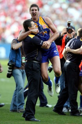 Peter Sumich celebrating Eagles' 2006 Grand Final win with Dean Cox.