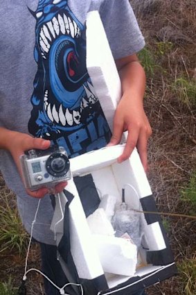 What's in the box? Jason shows the weather balloon's payload.