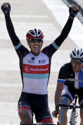 Experience prevails: Switzerland's Fabian Cancellara celebrates as he crosses the finish line ahead of Belgium's Sep Vanmarcke.