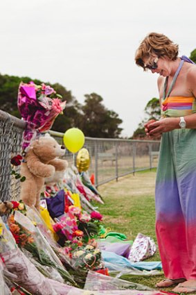 Luke Batty's mother, Rosie Batty, visits the oval where her son was killed by his father.