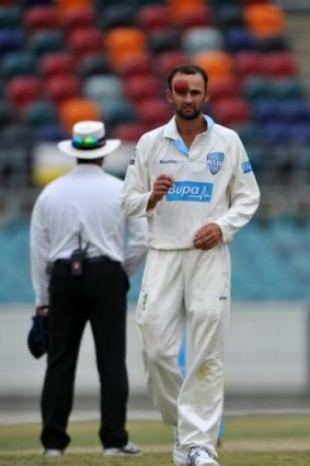 Frustrated: NSW spin bowler Nathan Lyon thought had had Shaun Marsh trapped LBW on 100.