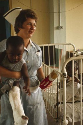 A US Peace Corps nurse and patient in Tanzania in 1964.
