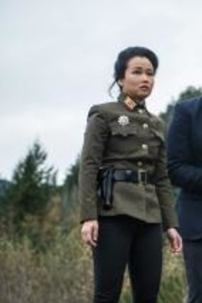 Diana Bang, as Sook, Seth Rogen, as Aaron, and James Franco, as Dave, in <i>The Interview</i>.