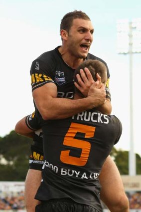 Entertainers ... Tigers Robbie Farah and Beau Ryan.