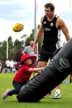Travis Cloke at a community camp in Morwell yesterday.