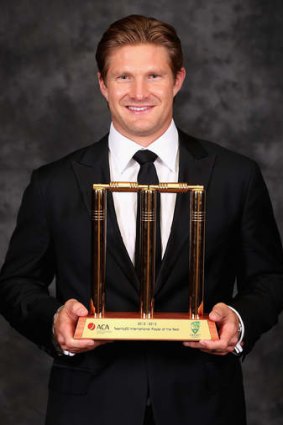 A golden pair: Shane Watson with his trophy.