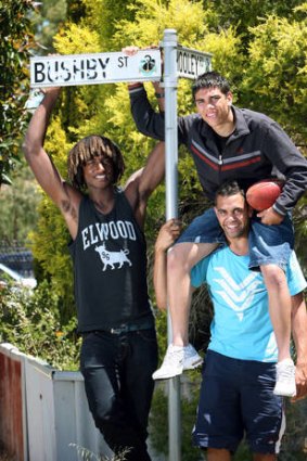 A 2008 image shows Nick Naitanui, Chris Yarran with Michael Walters on his shoulders in Bushby Street in Midvale, where they all grew up.