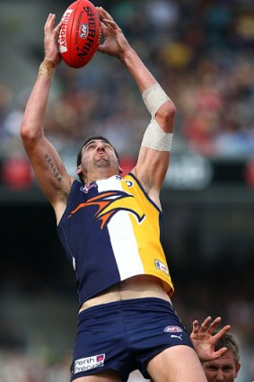 Dean Cox marks the ball during the round 11 AFL match between the West Coast Eagles and the Gold Coast Suns.