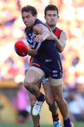 Nick Suban of the Dockers tests his strength against Jackson Merrett of the Bombers at Patersons Stadium on the weekend.