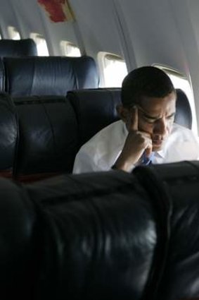 A similar photo shows Barack Obama on a campaign charter during his successful 2008 election campaign.