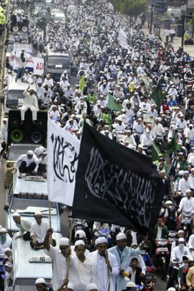 In Jakarta, thousands of members of hardline Islamic groups call for the Ahmadiyah sect to be disbanded. PICTURE: AP