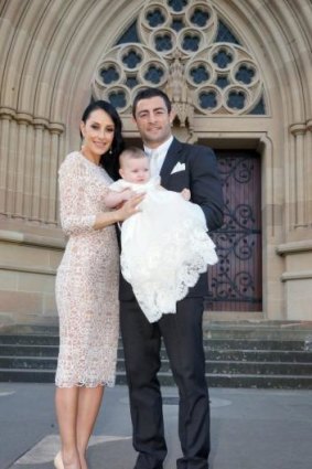 Terry Biviano, Anthony Minichiello and baby Azura on her christening day.