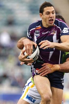 Billy Slater charges ahead for the Storm.