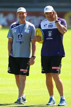 Ross Lyon and Peter Sumich look on during a Dockers training session at Fremantle Oval on Monday.