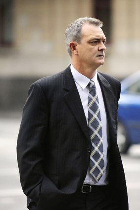 Former Victoria Police media director Stephen Linnell leaves court yesterday.