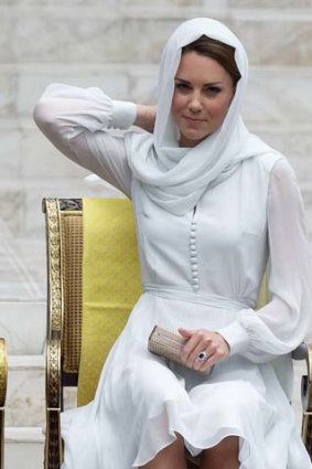 Subdued &#8230; the Duchess of Cambridge during a visit to a mosque in Kuala Lumpur on Friday.