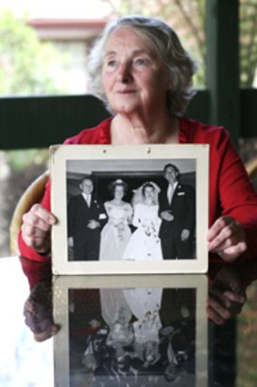 Elaine Postlethwaite with a photo from her wedding day.