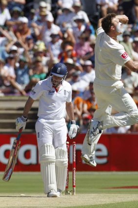 Doug Bollinger celebrates the wicket of England's captain Andrew Strauss this morning.