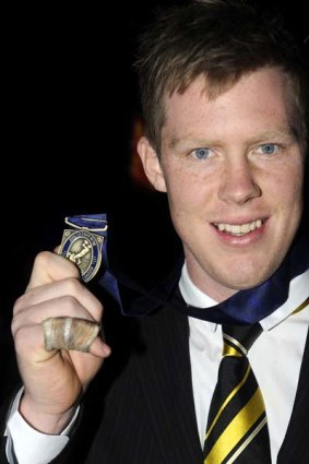 Richmond's Jack Riewoldt holds his Coleman Medal.