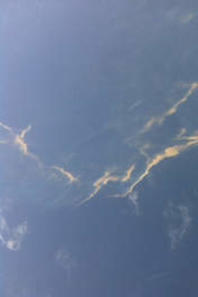 An aerial view of an oil spill is seen from a Vietnamese Air Force aircraft in the search area for a missing Malaysia Airlines plane, 250 km from Vietnam and 190 km from Malaysia, in this handout photo from Thanh Nien Newpaper. REUTERS