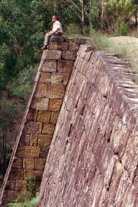 Punishing... a convict-built sandstone retainingwall on the trail.