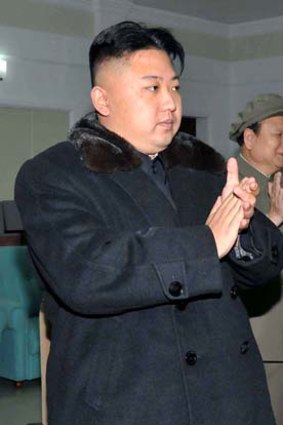 North Korean leader Kim Jong-Un watches the launch.