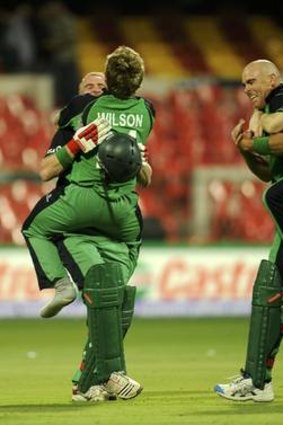 Giant killers ... Irish cricketers celebrate victory over England in their 2011 World Cup match in Bangalore.