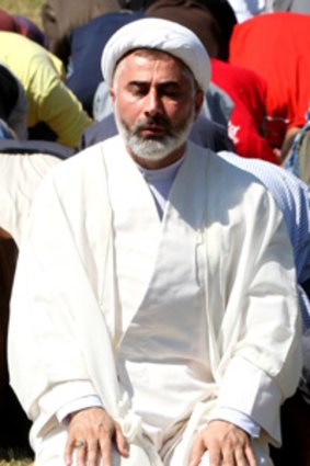 Sheikh Mansour Leghael at prayer.