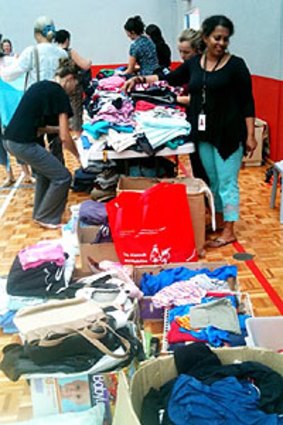 Boxes of donated clothes at the Armadale Arena relocation centre.