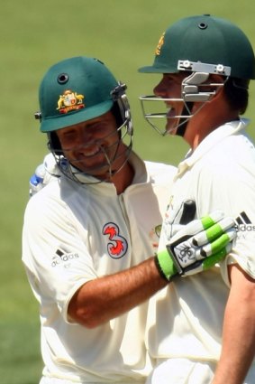 Ricky Ponting celebrates with Marcus North after the skipper's double century in Hobart yesterday.