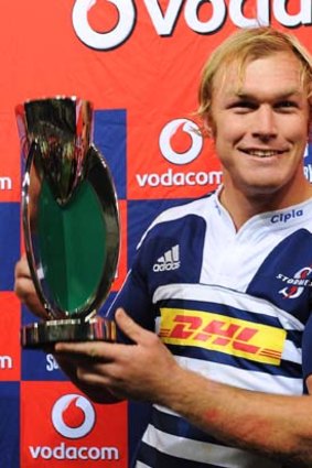 Schalk Burger of Stormers holds the South African conference trophy.