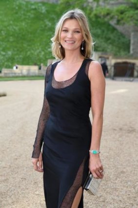 Boho queen: Kate Moss arrives for a dinner at Windsor Castle in May.