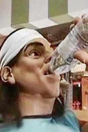 'Puppet' Nadal takes a drink.