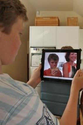 Lisa McLean's iPad has replaced many of her cookbooks on the kitchen bench.