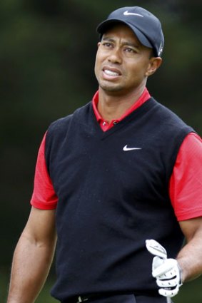 Tiger Woods grimaces at a wayward tee shot during the final round of the US Open at California's Olympic Club.