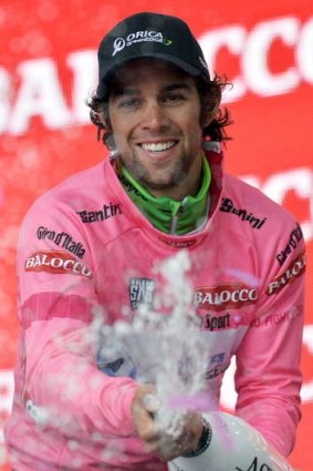 Michael Matthews celebrates on the podium after winning the sixth stage of the Giro d'Italia.