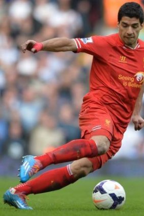 Happy feet: Liverpool's Luis Suarez has been devastating for the Liverpool season.