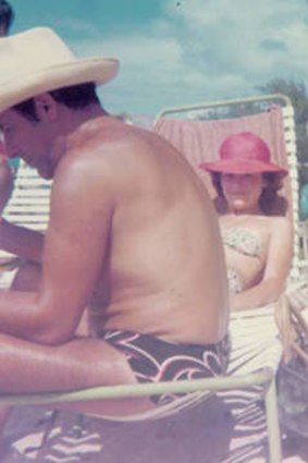Sunny daze … Louise Levene on holiday with her father in 1974.