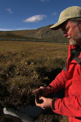 Scientist Kevin Schaefer takes land-based readings above the Arctic Circle.