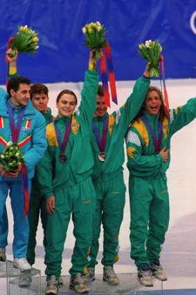 The bronze medal winners celebrate their success: Richard Nizielski, Steven Bradbury, Andrew Murtha and Kieran Hansen.
