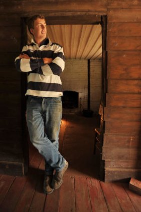 A short history lesson: Seventh-generation Tasmanian farmer Will Archer, 23, is forced to duck in the doorways of the original farm buildings at Brickendon, his family's property in northern Tasmania.
