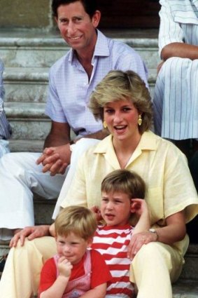 'Her love for them was almost obsessive': The Prince and Princess of Wales on holiday with their children in 1987.