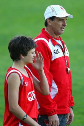 Paul Roos and his son. Roos faces an AFL code-of-conduct hearing tomorrow night.