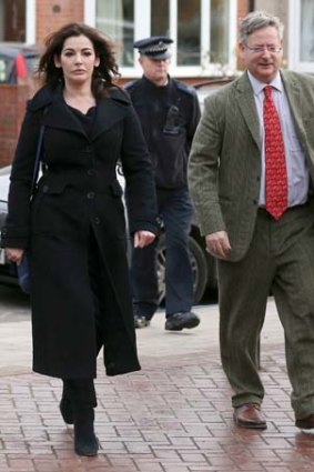 Family support: Nigella Lawson and her brother Dominic Lawson arrive at Isleworth Crown Court.