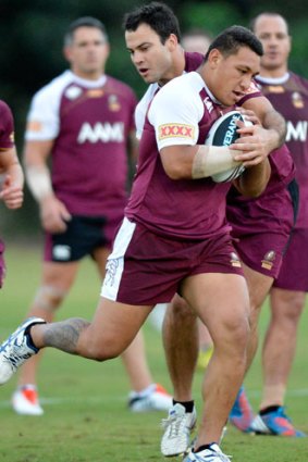 Josh Papalii passes the ball during a Queensland Maroons State of Origin training session at Palmer Resort Coolum on May 29, 2013 in Brisbane, Australia.